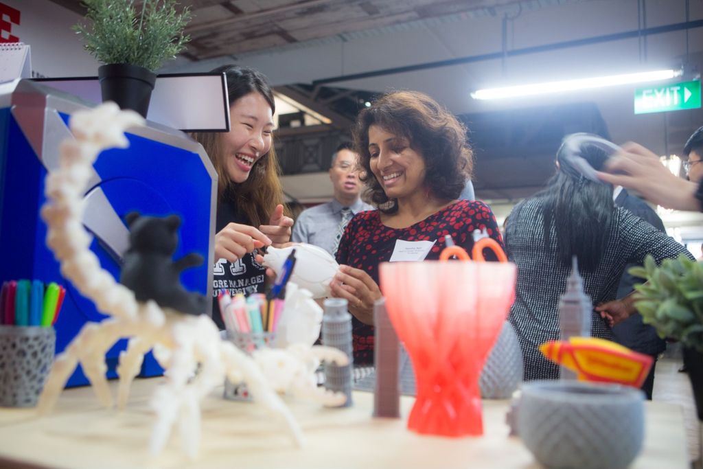Miniature of A student showcasing various ideas generated with 3D printing machines from the newly opened Makerspace in SMU Labs