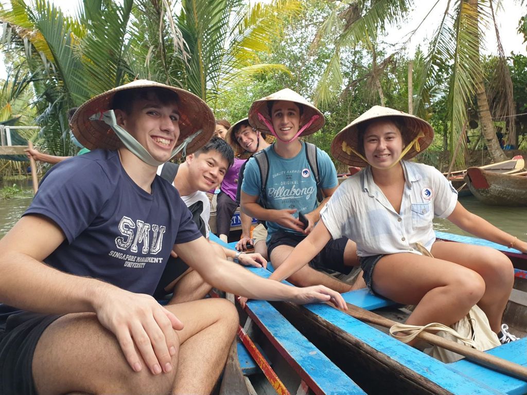 Miniature of SMU-XO students on a boat cruise along the Mekong River, Ho Chi Minh City, Vietnam