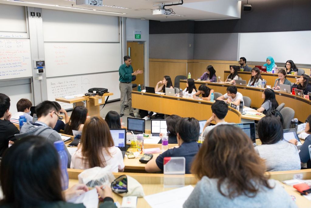 Miniature of A professor conducting a lecture in a seminar room