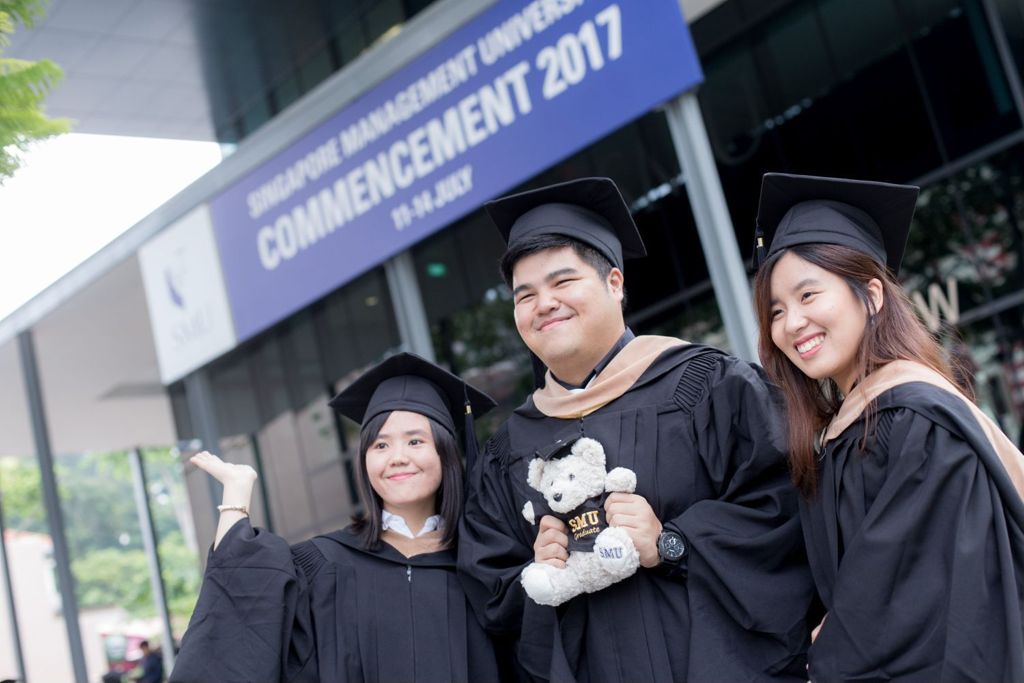 Miniature of Graduates posing in front of the newly built School of Law in 2017